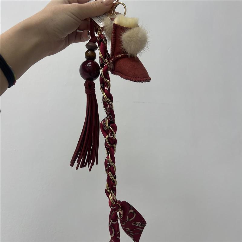 portachiave con charm winter boot